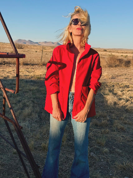 Garbo wears the new red jacket