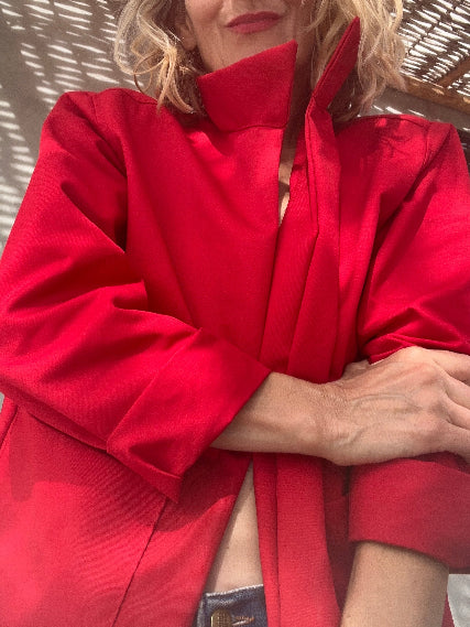Garbo wears the new red jacket